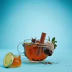 Image showing The herbal tea on a blue background