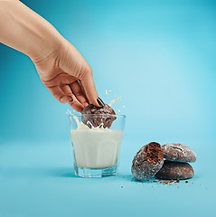 Image showing Glass of milk and oatmeal cookies. Morning dessert