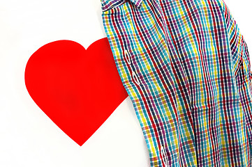 Image showing Closeup of T-shirt with a red heart under colorful unbuttoned sh