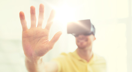 Image showing young man in virtual reality headset or 3d glasses