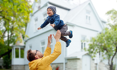 Image showing father with son playing and having fun outdoors