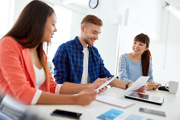 Image showing happy creative team or students working at office