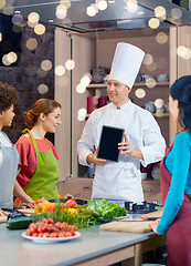 Image showing happy women with chef and tablet pc in kitchen