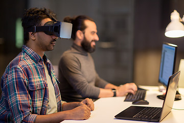 Image showing creative man in virtual reality headset at office