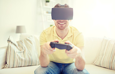 Image showing man in virtual reality headset with controller