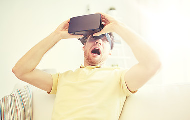 Image showing young man in virtual reality headset or 3d glasses