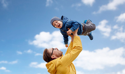 Image showing father with son playing and having fun outdoors