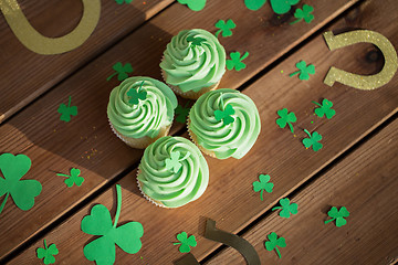 Image showing green cupcakes, horseshoes and shamrock