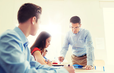 Image showing group of students and teacher at school classroom