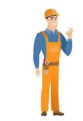 Image showing Smiling builder showing ok sign.