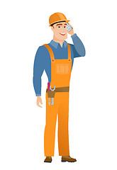 Image showing Builder talking on a mobile phone.