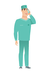 Image showing Doctor talking on a mobile phone.