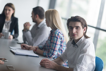 Image showing Group of young people meeting in startup office