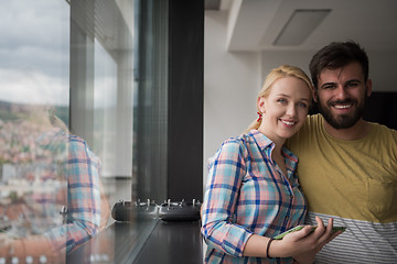 Image showing Business People Working With Tablet in startup office