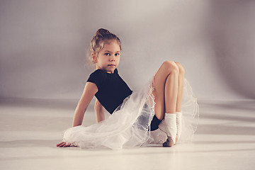 Image showing The little balerina dancer on gray background