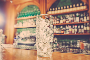 Image showing Washed professional bar equipment and a glass filled with ice
