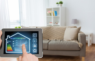 Image showing tablet pc with smart home settings on screen