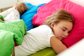 Image showing little girls sleeping in bed at home