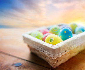 Image showing close up of colored easter eggs in basket