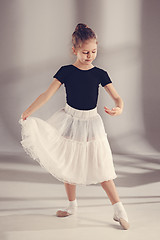 Image showing The little balerina dancer on gray background