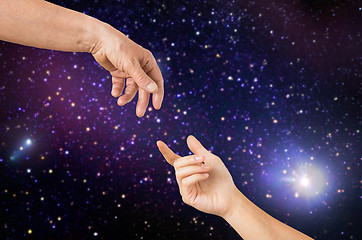 Image showing close up of senior and young woman hands in space