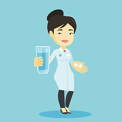 Image showing Pharmacist giving pills and glass of water.