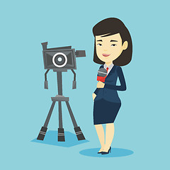 Image showing TV reporter with microphone and camera.