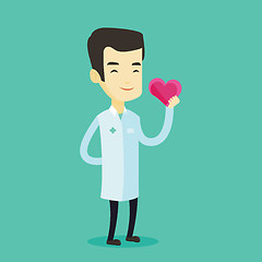 Image showing Doctor cardiologist holding heart.