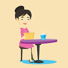 Image showing Woman surfing in the social network in cafe.