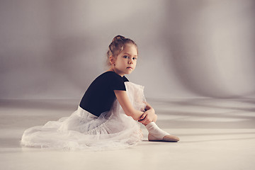 Image showing The little balerina dancer on gray background