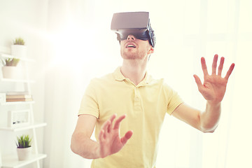 Image showing young man in virtual reality headset or 3d glasses