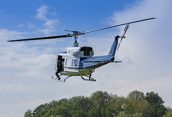 Image showing Special forces in helicopter in a low flight