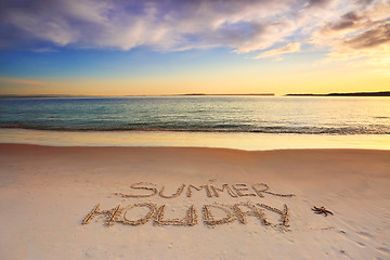 Image showing Summer Holiday etched into the sand of beach