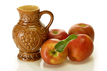 Image showing Brown Wine Jug with Apples