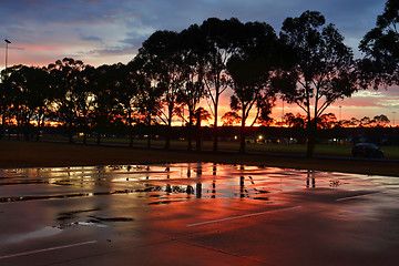 Image showing Sunset skies after the the rain 