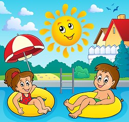 Image showing Children in swim rings image 3