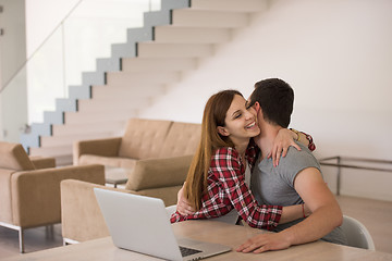 Image showing happy young couple buying online