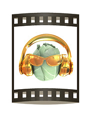 Image showing Green cabbage with sun glass and headphones front \