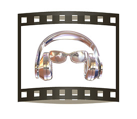 Image showing glasses and headphones. 3d illustration. The film strip.