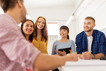 Image showing creative team talking at office