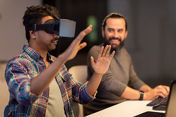 Image showing creative man in virtual reality headset at office