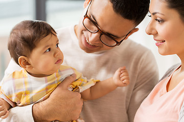 Image showing happy family with baby daughter at home