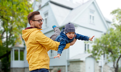 Image showing father with son playing and having fun outdoors