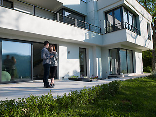 Image showing couple enjoying morning coffee