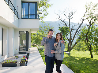 Image showing couple enjoying morning coffee