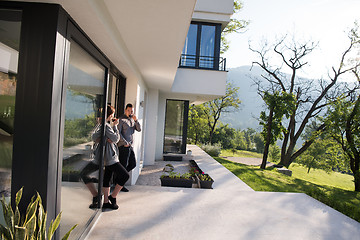 Image showing couple enjoying on the door of their luxury home villa