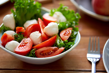 Image showing close up of vegetable salad with mozzarella