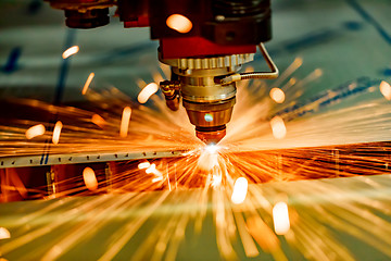 Image showing CNC Laser cutting of metal, modern industrial technology.