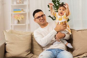 Image showing happy father with little baby daughter at home
