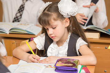 Image showing First-grader in class at school